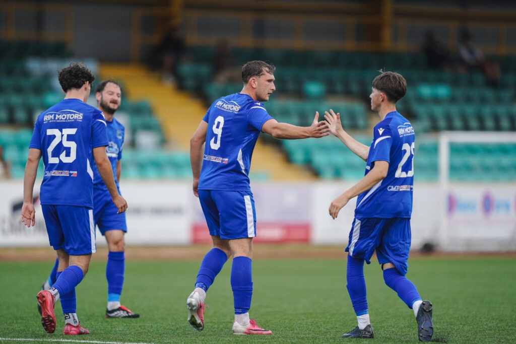 BARRY, WALES  - 25 JULY 2026:Oliver Jay Amos of Cardiff Airport celebrates scoring the third goal during the FAW Welsh Cup 2026/27 - Qualifying Round fixture Cardiff Airport vs Felinfach FC at Jenner Park, Barry, Wales (Pic by Jamie Edwards/FAW)