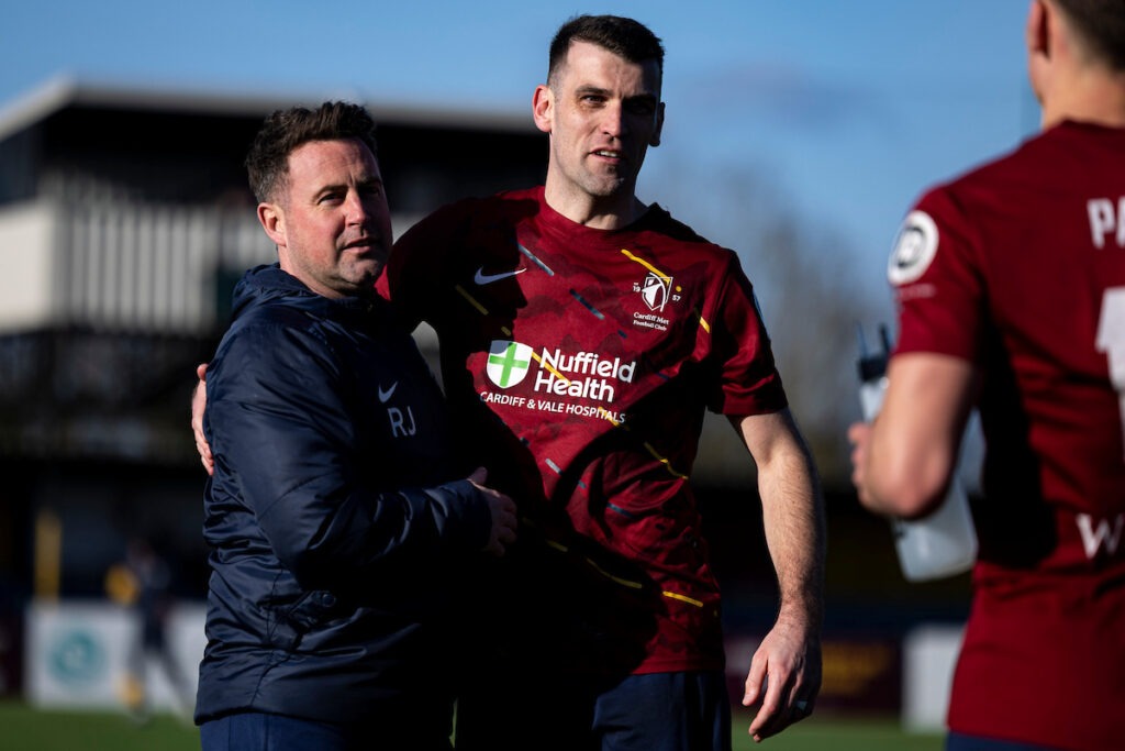 Cardiff Met manager Ryan Jenkins & Adam Roscrow of Cardiff Met during the 2025/26 JD Cymru Premier match between Cardiff Met & Bala Town at Cyncoed Campus, Cardiff, Wales