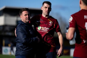 Cardiff Met manager Ryan Jenkins & Adam Roscrow of Cardiff Met during the 2025/26 JD Cymru Premier match between Cardiff Met & Bala Town at Cyncoed Campus, Cardiff, Wales