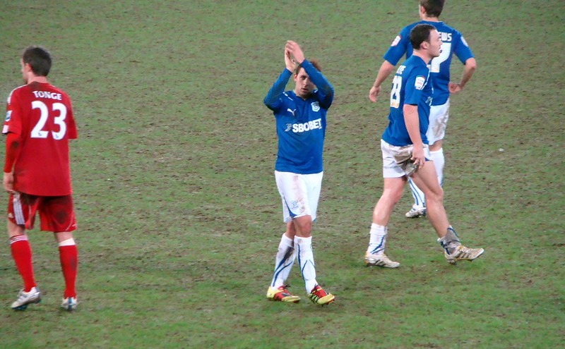 Michael Chopra applauds the Cardiff City fans in an FA Cup tie against Stoke City