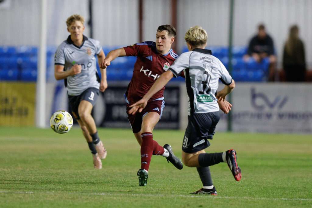 COLWYN BAY, WALES - 31 JULY 2026: Matty Hill of Colwyn Bay and Declan John De-Vulgt of Trefelin BGC during the Novira Cymru Premier game between Colwyn Bay and Trefelin BGC at The Blue Turtle Arena in Colwyn Bay. (Pic by James Baylis/FAW)