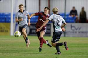 COLWYN BAY, WALES - 31 JULY 2026: Matty Hill of Colwyn Bay and Declan John De-Vulgt of Trefelin BGC during the Novira Cymru Premier game between Colwyn Bay and Trefelin BGC at The Blue Turtle Arena in Colwyn Bay. (Pic by James Baylis/FAW)
