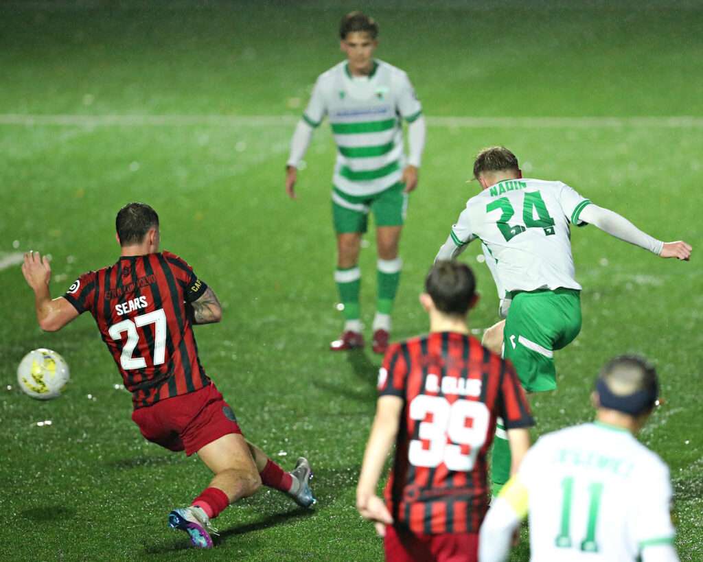 Jack Nadin of The New Saints F.C. scores his second goal during The New Saints FC vs Caernarfon Town in Round 4 of the Nathaniel MG Cup at Park Hall, Oswestry