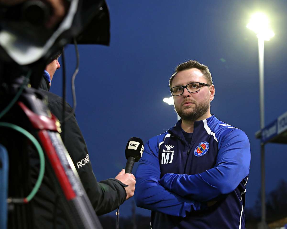 Michael Johnston, Manager of CPD Dinas Bangor 1876 is interviewed by Sgorio after CPD Dinas Bangor 1876 vs Trefelin BGC in Round 4 of the JD Welsh Cup at Bangor City Stadium, Bangor