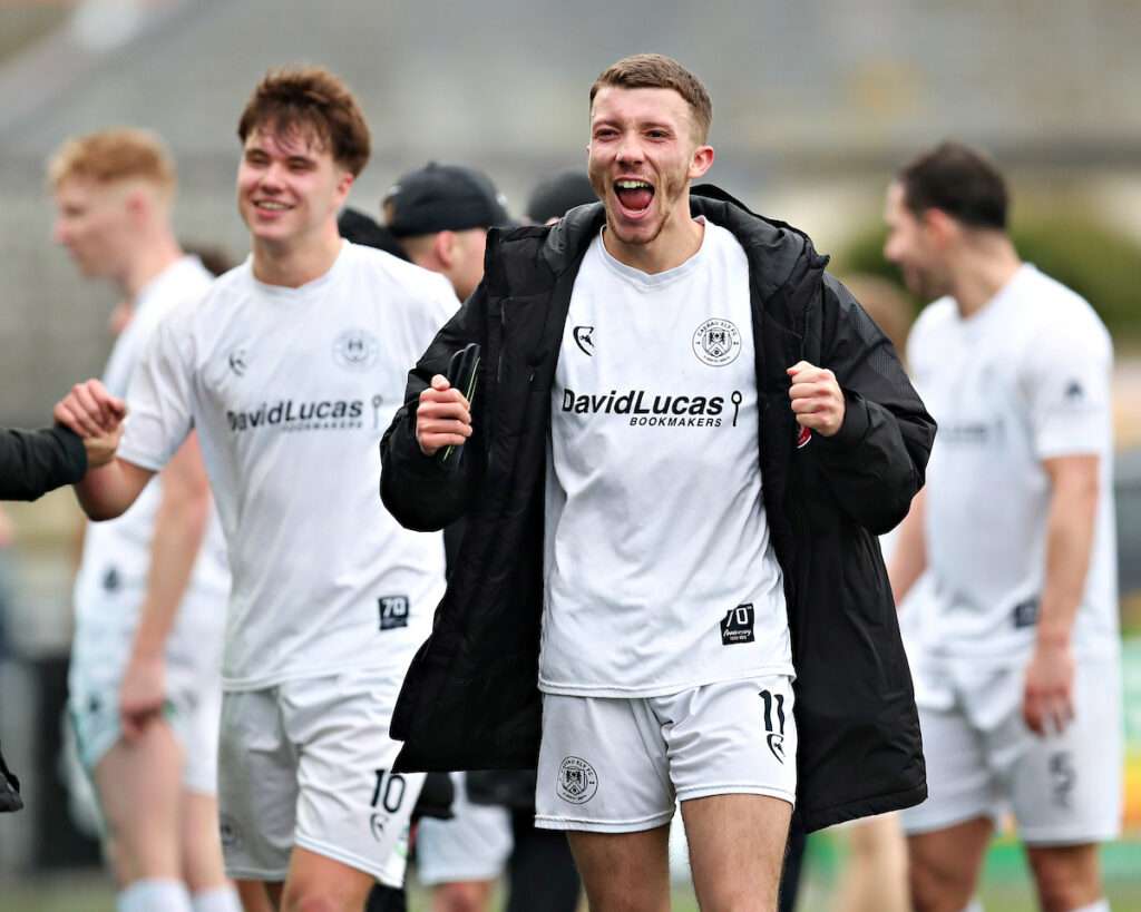 Liam Bishop of Caerau Ely AFC celebrates after Aberystwyth Town vs Caerau Ely AFC in Round 24 of the JD Cymru South at Park Avenue, Aberystwyth
