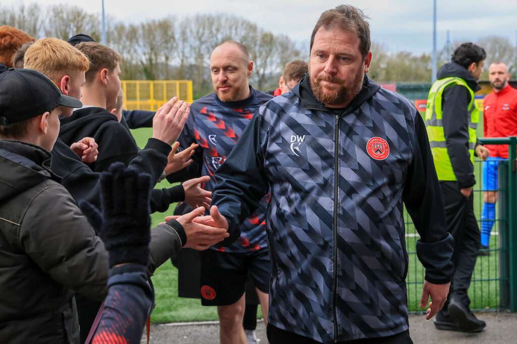 Caerau Ely manager Dean Wheeler engages with Welsh football fans 