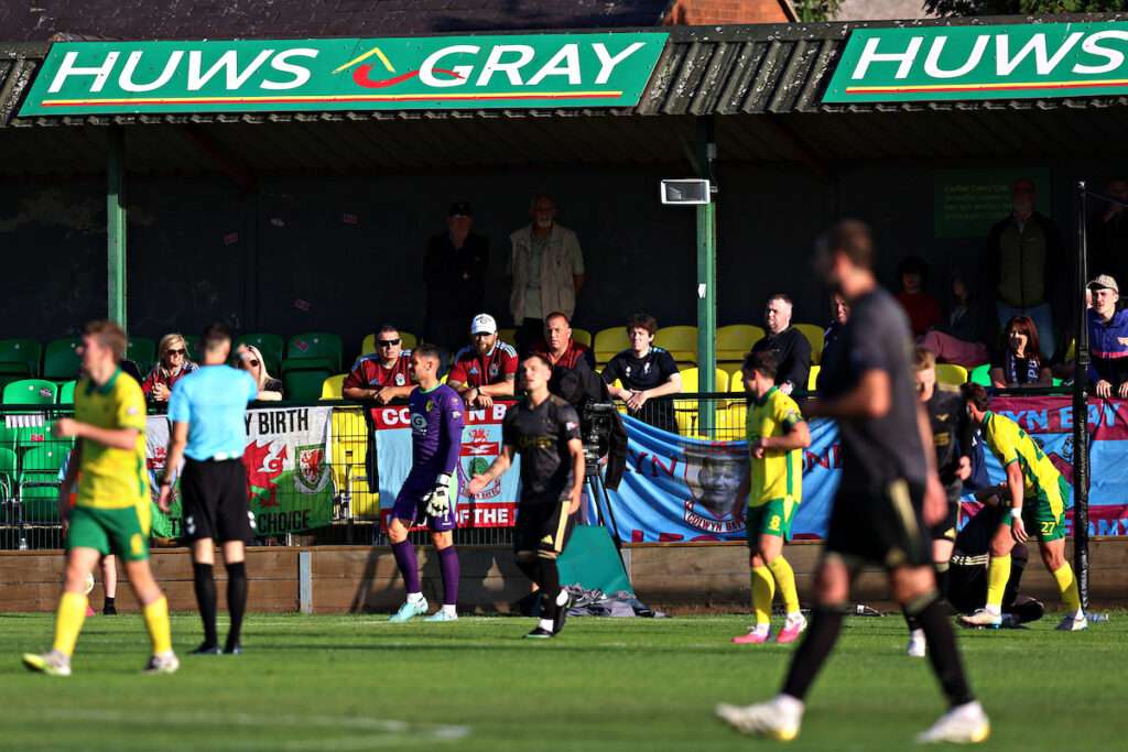Colwyn Bay fans during Caernarfon Town vs Colwyn Bay FC in Round 3 of the Novira Cymru Premier at The Oval, Caernarfon