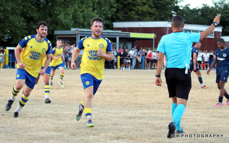 A Cwmbran Celtic player celebrates scoring against Cwmbran Town