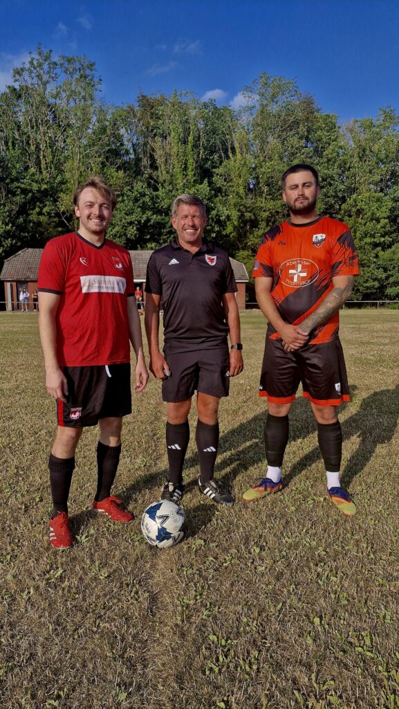 South Wales Premier League sides Tongwynlais and Aber Valley pose for a photo prior to kick-off