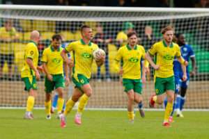 Osian Evans of Caernarfon Town celebrates after scoring a goal to make it 1-2 during the Novira Cymru Premier game between Caernarfon Town and The New Saints at the The Oval Stadium in Caernarfon