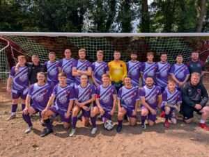 Rhydyfelin Non Pol pose for a squad photo