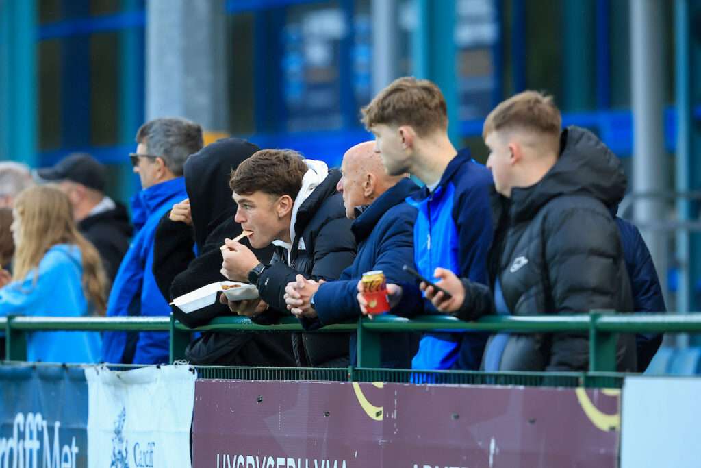 Fans during the 2025/26 JD Cymru Premier league fixture between Cardiff Met University FC & Connah’s Quay Nomads at Cyncoed Stadium, Cardiff, Wales