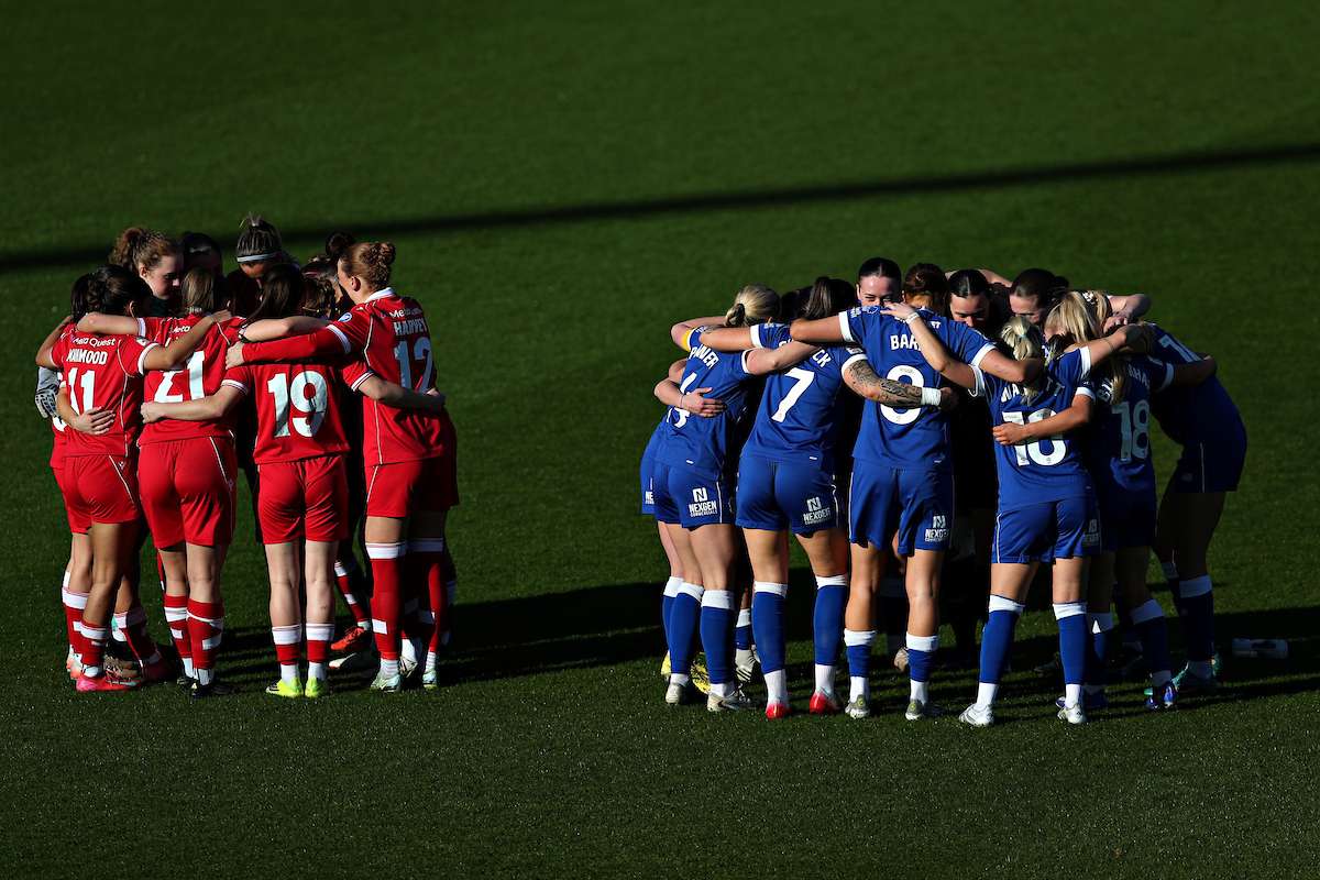 Both teams huddle before Wrexham AFC Women vs Cardiff City Women in Round 5 of the Genero Adran Premier Championship at the SToK Cae Ras, Wrexham