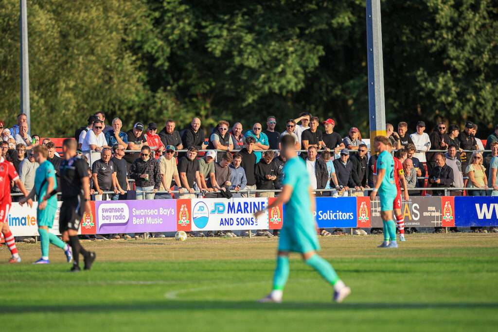 Fans during the 2026/27 Novira Cymru Premier League fixture between Briton Ferry Llansawel & Ammanford AFC at The Renewable Centre Stadium, Neath, Wales.