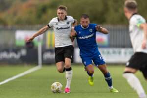 ,Nathan Wood of Penybont and Clayton Green of Haverfordwest County battle for the ball during the Novira Cymru Premier 2026/27 fixture Haverfordwest County vs Penybont at Ogi Bridge Meadow, Haverfordwest, Wales
