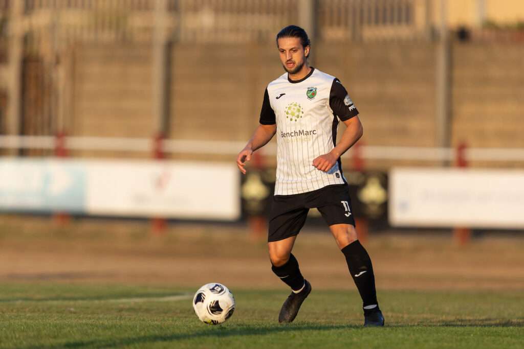 ,Josh Dorward of Pontardawe Town runs with the ball during the Novira Cymru South fixture between Afan Lido and Pontardawe Town at the Marstons Stadium in Aberavon on the 21st August 2026
