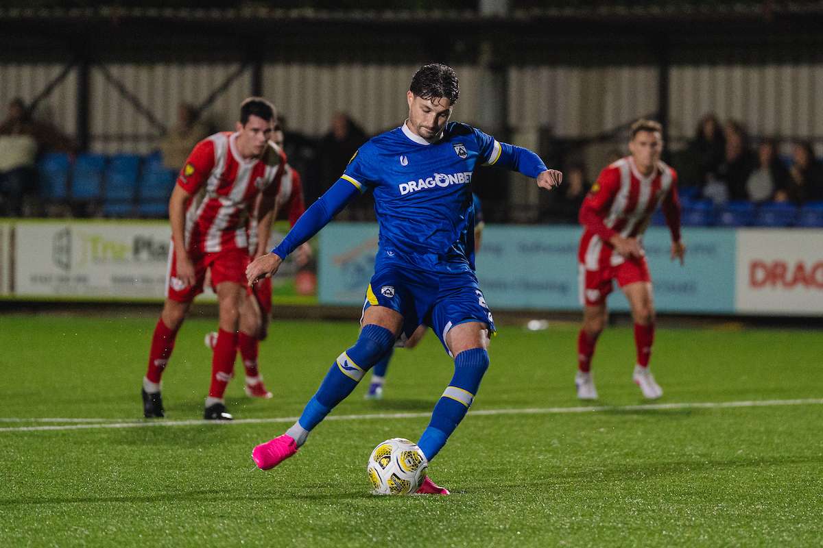 Haverfordwest County's Ben Ahmun puts the home side ahead from the penalty spot during the Novira Cymru Premier 2026/27 fixture Haverfordwest County vs Hollywell Town at Dynamite Bridge Meadow Stadium, Haverfordwest, Wales