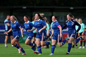 Bangor celebrate winning the penalty shootout after CPD Dinas Bangor 1876 Women vs Llangefni Town Ladies in 1st Qualifying Round of the Bute Energy Welsh Cup at Bangor City Stadium, Bangor