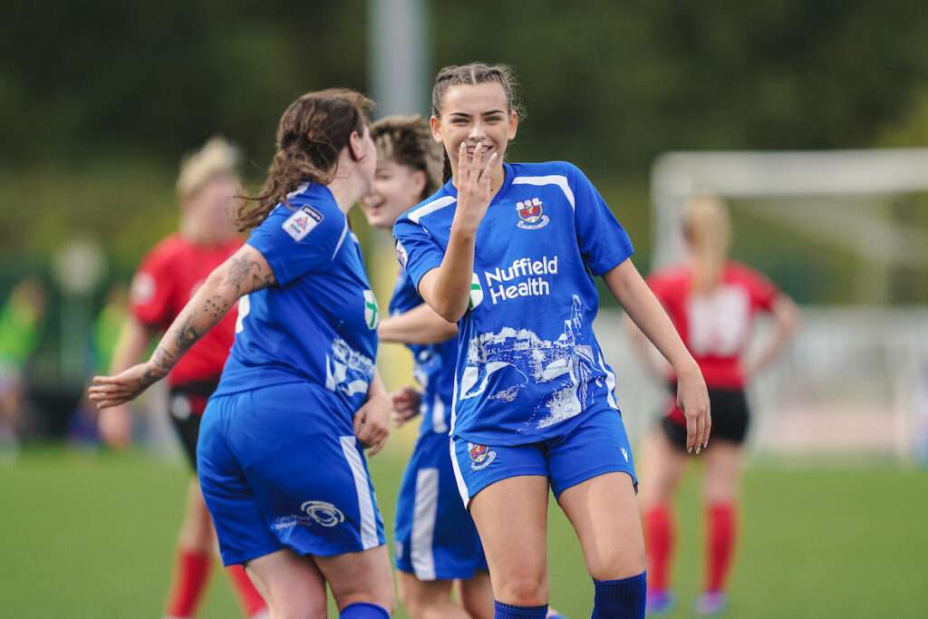 Penybont Women's Megan-ruby Clarke completes her hat trick during the Genero Adran Leagues South 2026-27 fixture Penybont Women vs Cambrian United Women at Dragonbet Stadium, Bridgend, Wales