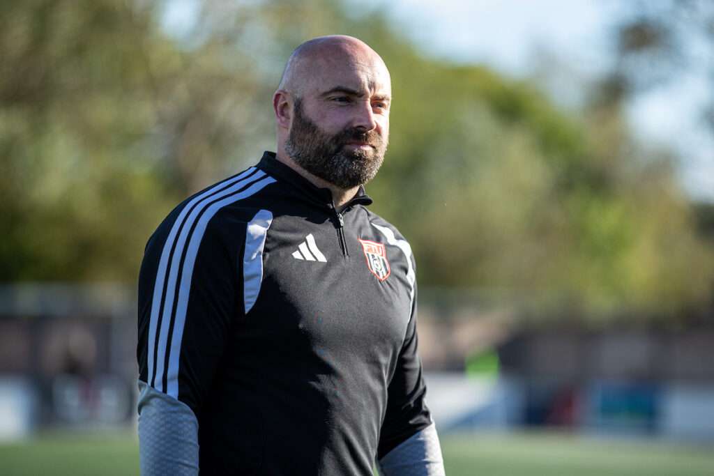 Flint Town Manager Danny Holmes following the 2026-27 Novira Cymru Premier match between Flint Town United and Ammanford at Essity Stadium, Flint, Wales