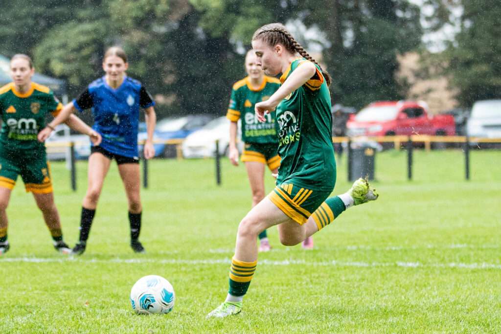 Maizie Johnson of Wrexham Foresters opens the scoring from the penalty spot during the 2026-27 Genero Adran North match between Wrexham Foresters and Berriew at Stansty Park, Wrexham, Wales.