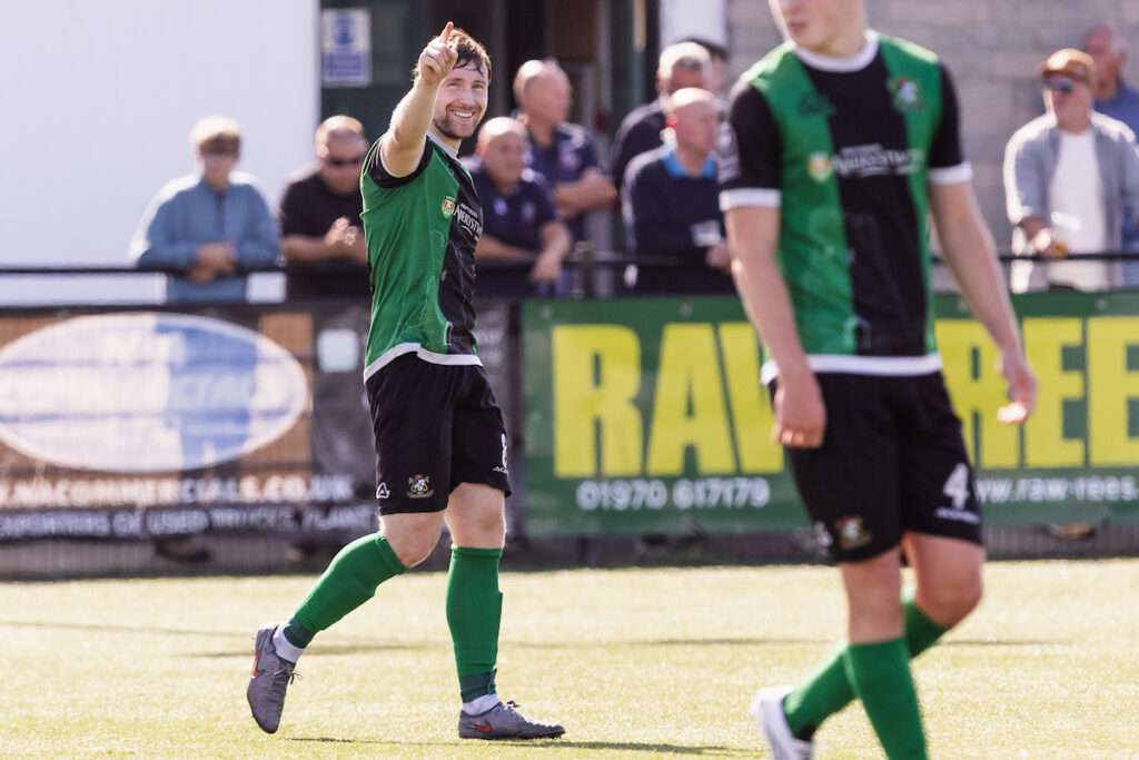 Aberystwyth Town's Liam Walsh scores and celebrates 4-1 during the 2026/27 Novira Cymru South fixture between Aberystwyth Town FC & Llantwit Major FC at Park Avenue, Aberystwyth, Wales 