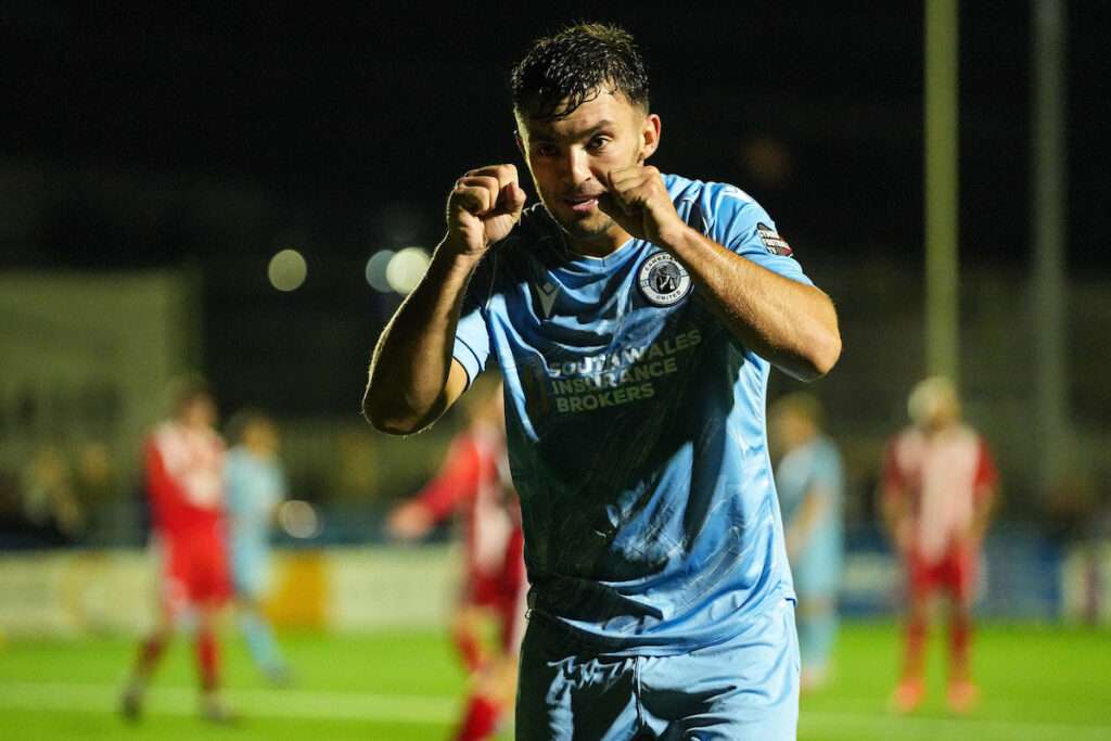 Liam Eason of Cambrian United celebrates scoring his teams first goal during the 2026/27 Novira Cymru Premier fixture between Cambrian United & Holywell Town at M&P Group 3G Stadium, Tonypandy, Wales