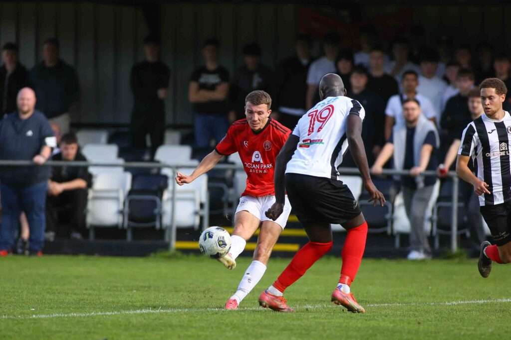 Caerau Ely's Liam Bishop takes a shot against Cardiff Dracs in the Cymru South