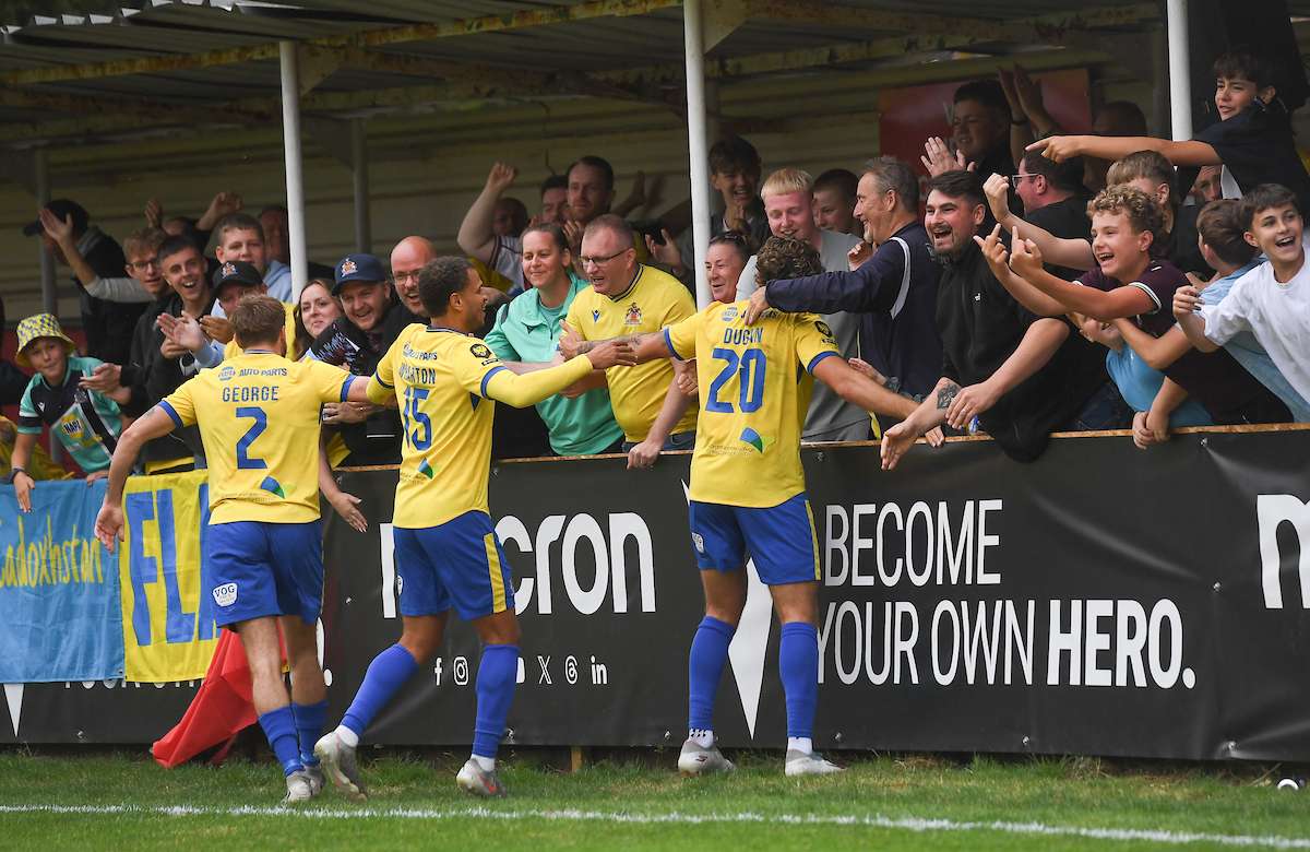 BRITON FERRY, WALES - 01 SEPTEMBER 2026: during the Novira Cymru Premier 26/27 Phase 1 match between Briton Ferry Llansawel FC and Barry Town United AFC at the Renewable Centre Stadium in Briton Ferry on the 31sr August 2026. (Pic by Ian Cook/FAW) -Barry Town's Elliot Dugan celebrates his hat-trick