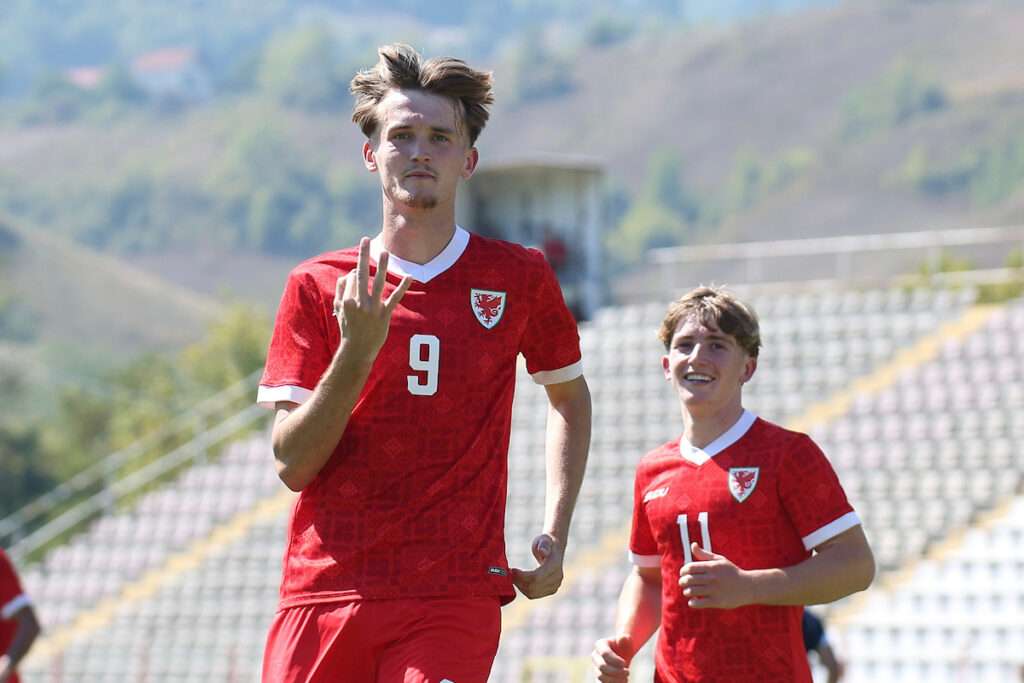 Casey Coughlin celebrates a goal for Cymru South XI in the Regions Cup