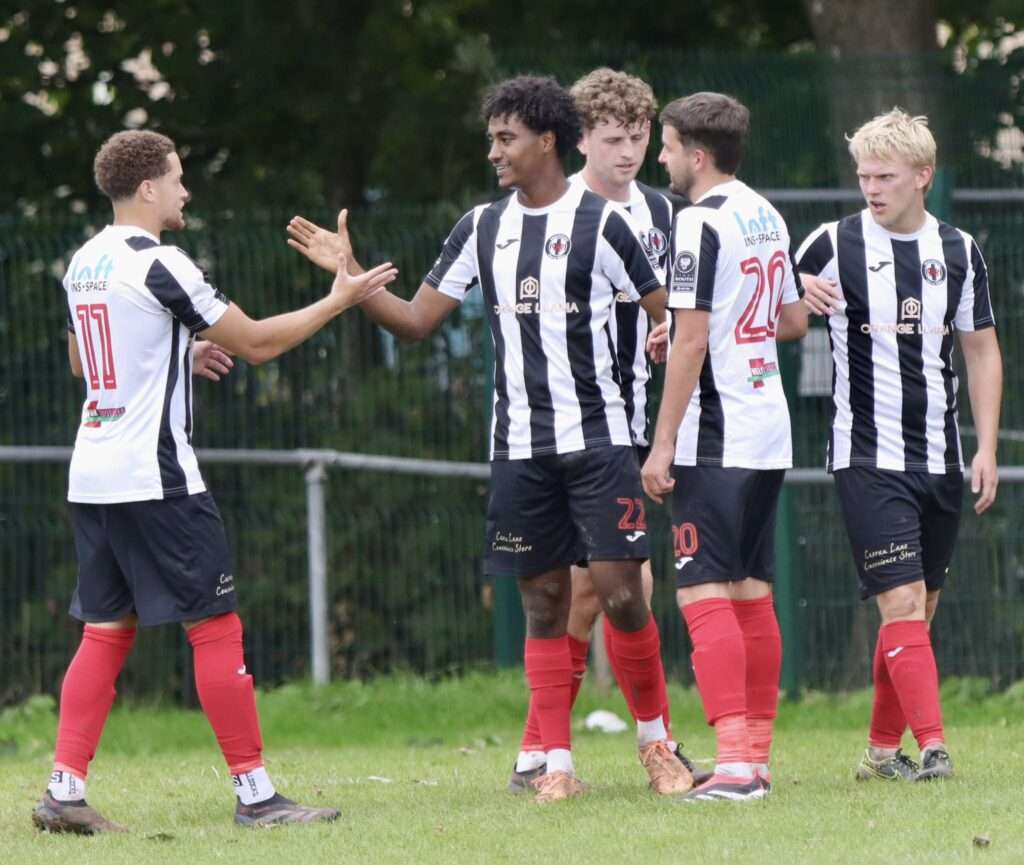 Cardiff Draconians celebrate against Aberbargoed Buds in the Welsh Cup