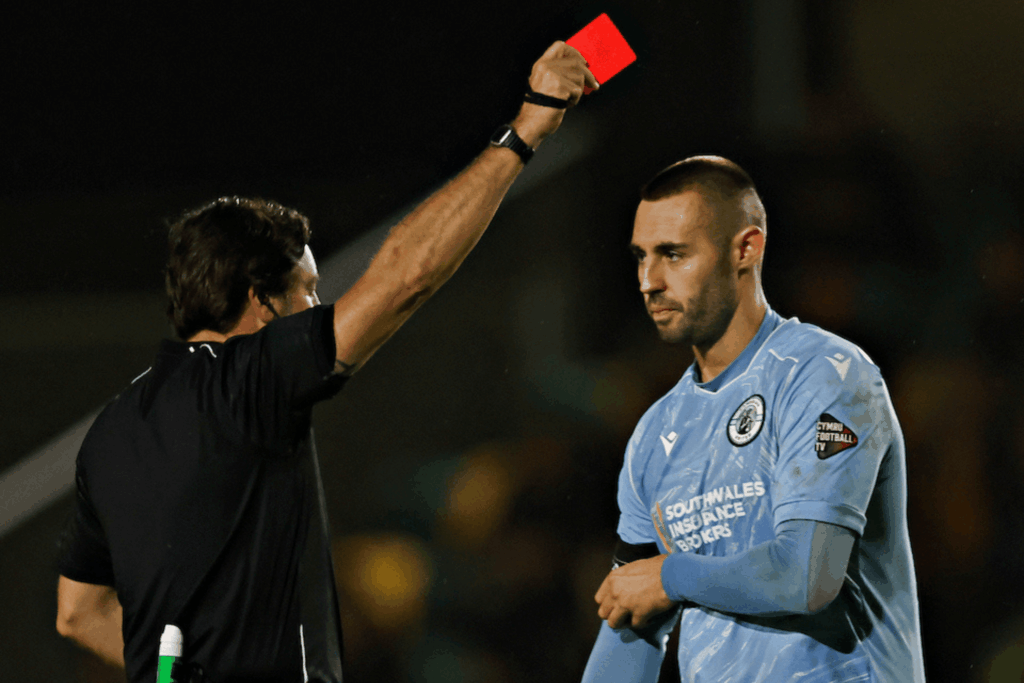 CAERNARFON, GWYNEDD, WALES - 18th SEPTEMBER 2026 - Cambrian United's Kyle Jones is sent off during Caernarfon Town vs Cambrian United in Round 10 of the Novira Cymru Premier at The Oval, Caernarfon