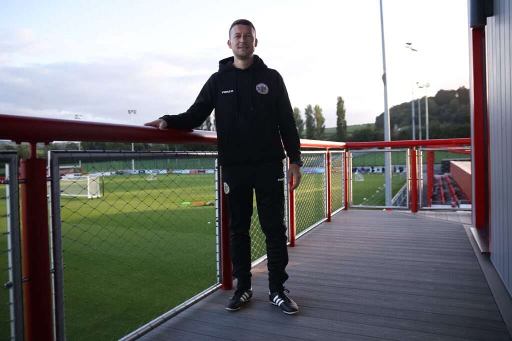 Eddie Maurice-Jones poses during his managerial unveiling at Denbigh Town