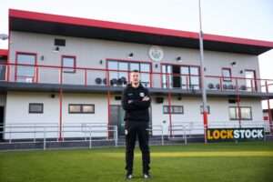 Eddie Maurice-Jones poses during his managerial unveiling at Denbigh Town