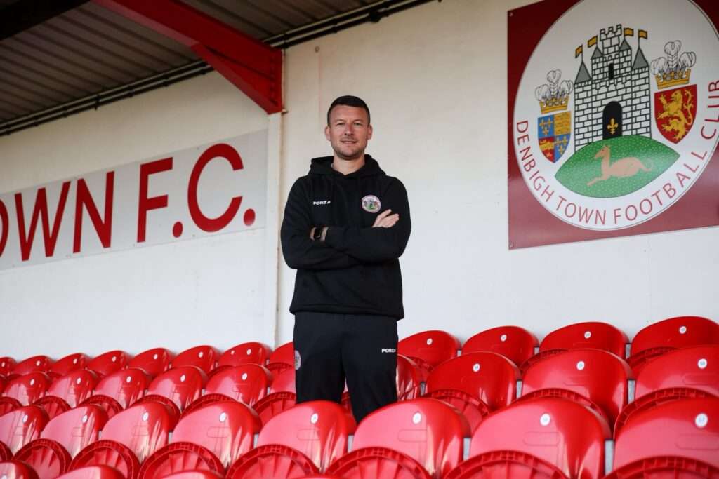 Eddie Maurice-Jones poses during his managerial unveiling at Denbigh Town