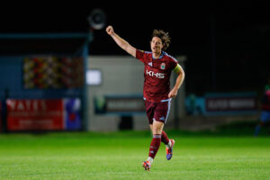 COLWYN BAY, WALES - 23 OCTOBER 2026: Sam Hart of Colwyn Bay celebrates after scoring a goal to make it 2-1 direct from a corner during the Novira Cymru Premier game between Colwyn Bay and Cardiff Met at The Blue Turtle Arena in Colwyn Bay.