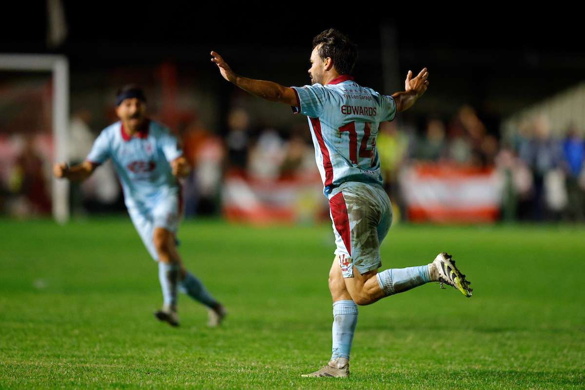 HOLYWELL, WALES - 28 AUGUST 2026: Noah Edwards of Caernarfon Town celebrates after scoring a goal to make it 3-5 during the Novira Cymru Leagues Premier game between Holywell Town and Caernarfon Town at the Barton’s North Wales Stadium in Holywell
