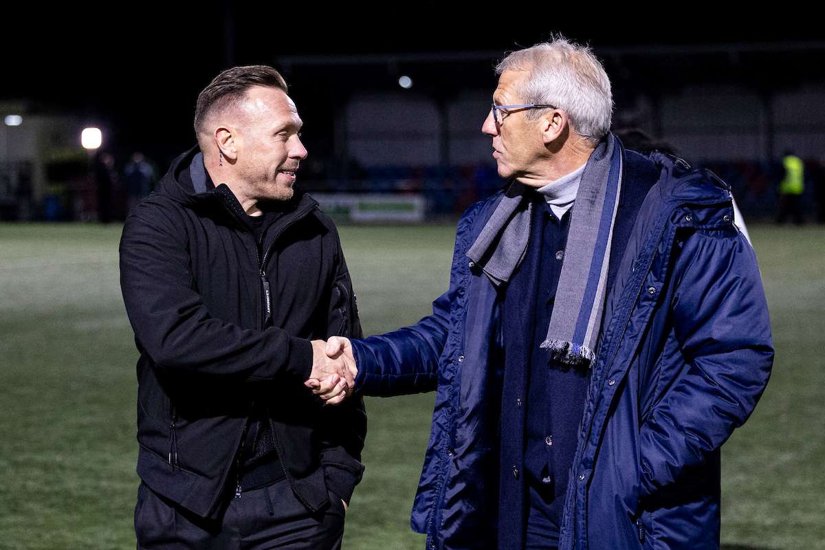 NEWTOWN, WALES - 28 FEBRUARY 2025: Craig Bellamy & Mark Jones after the 2024/25 Nathaniel MG Cup Final fixture between Aberystwyth Town FC & The New Saints FC at Latham Park, Newtown