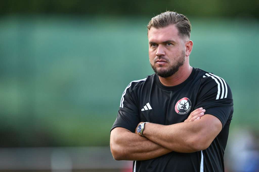 Asa Hamilton Manager of Buckley Town during the pre-game warmup ahead of the JD Cymru North game between Buckley Town and Ruthin Town at the Globe in Buckley on the 15th August 2025
