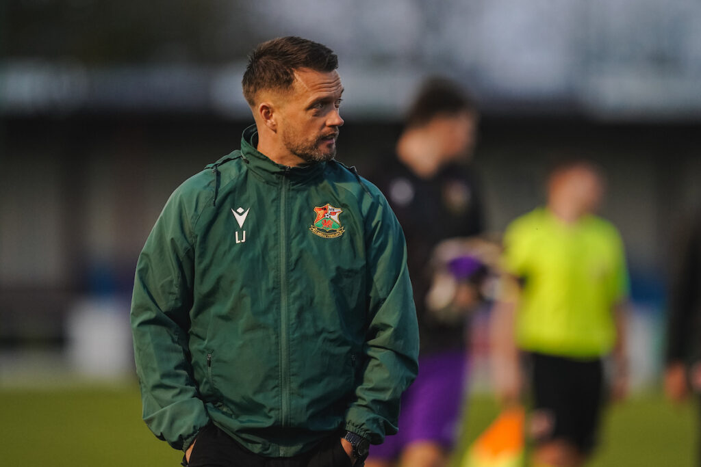 Llanelli Town Manager Lee John during the JD Cymru Premier 2025/26 fixture Colwyn Bay vs Llanelli Town at The Blue Turtle Arena, Colwyn Bay, Wales