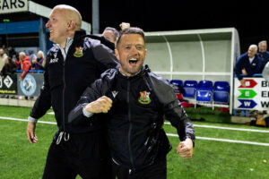 Llanelli Town manager Lee John celebrates at full time. Cambrian United v Llanelli Town in the JD Cymru South at the M&P Group 3G