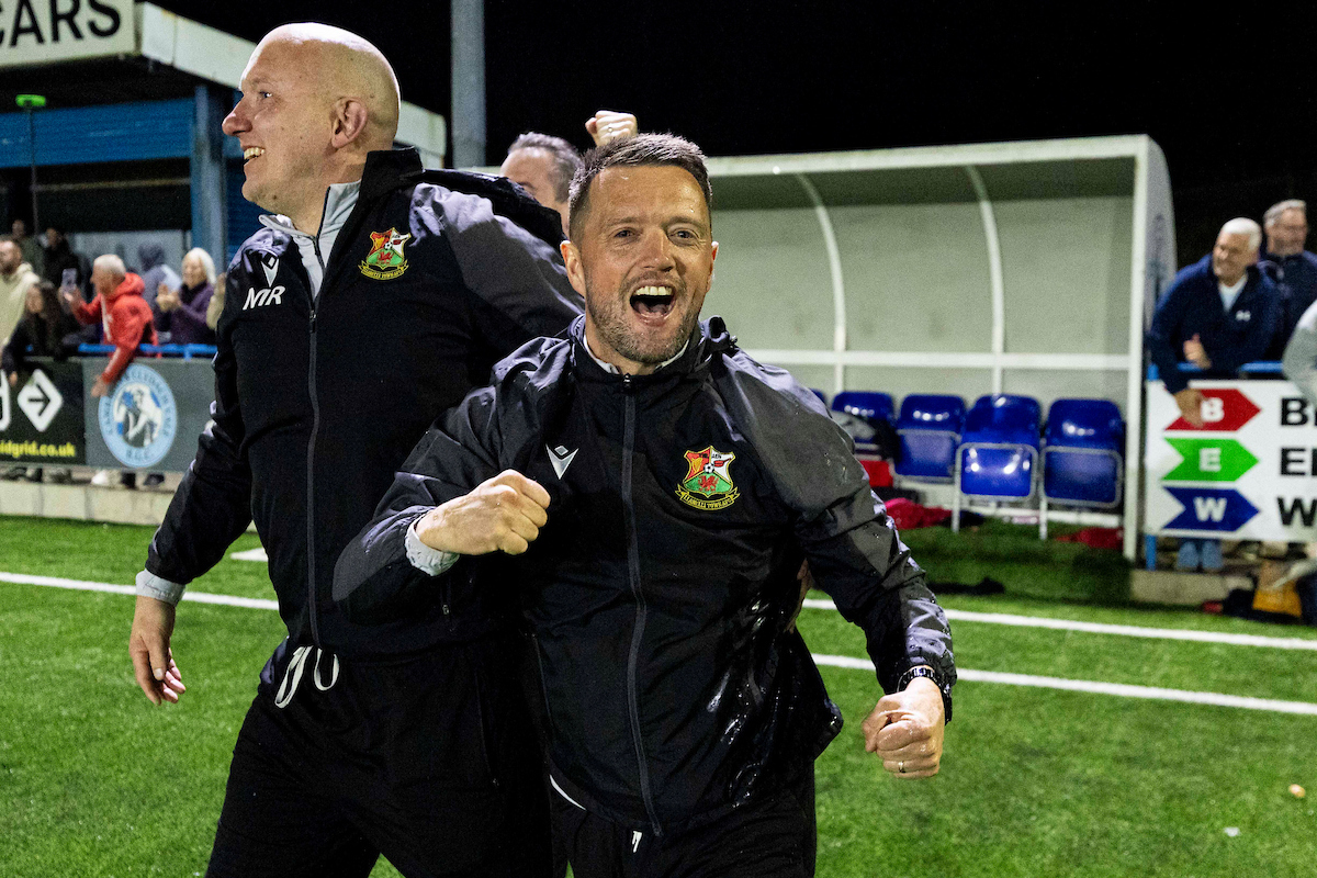 Llanelli Town manager Lee John celebrates at full time. Cambrian United v Llanelli Town in the JD Cymru South at the M&P Group 3G