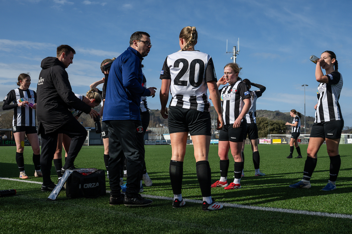 Jay Davies Manager of Llandudno Ladies gives her team instructions in a break in play during the Genero Adran North game between Llandudno and Connah's Quay Nomads at the Go