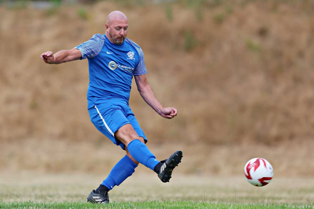 Mike Lundstram of Bethesda Athletic takes a penalty during Llansantffraid Village FC vs Bethesda Athletic in the FAW Welsh Cup First Qualifying Round at the Llansantffraid Recreation Ground, Treflan, Llansantffraid-ym-Mechain