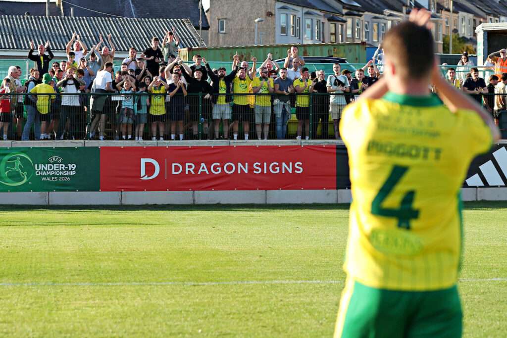Jordan Piggott of Caernarfon Town applauds the fans after Caernarfon Town vs Colwyn Bay FC in Round 3 of the Novira Cymru Leagues Premier at The Oval, Caernarfon