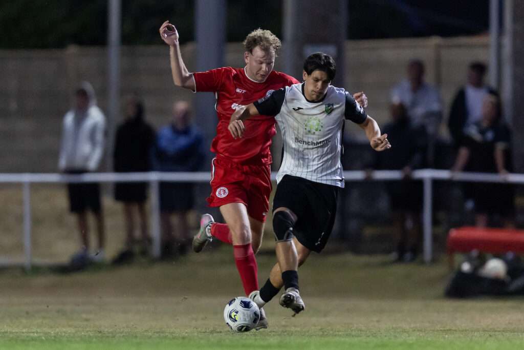,Matthew Richards of Afan Lido pressures Jay Farrell-Alli of Pontardawe Town fore the ball during the Novira Cymru South fixture between Afan Lido and Pontardawe Town at the Marstons Stadium in Aberavon on the 21st August 2026