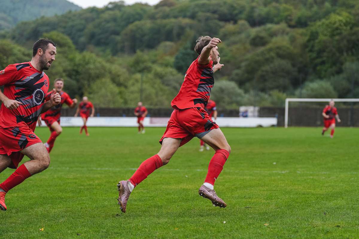 Rhydyfelin Non Pol's Dylan Reid celebrating his goal during the FAW Welsh Cup 2026-27 Round 1 fixture Goytre United vs Rhydyfelin Non Pol at Glenhafod Park Stadium, Port Talbot, Wales