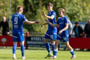 ,Rhys Hughes of The New Saints celebrates scoring his teams first goal during the Novira Cymru Premier 2026/27 fixture between Trefelin BGC and The New Saints at Ynys Park, Port Talbot, Wales