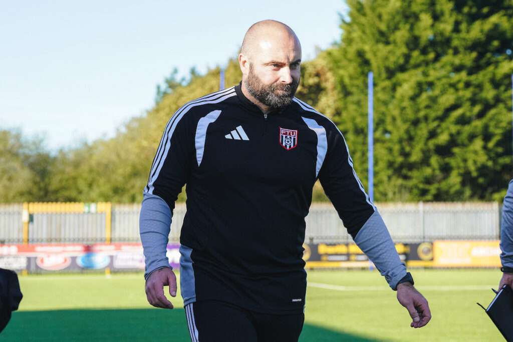 Flint Town United Manager Danny Holmes during the Novira Cymru Premier 2026/27 fixture Haverfordwest County vs Flint Town United at Dynamite Bridge Meadow Stadium, Haverfordwest, Wales
