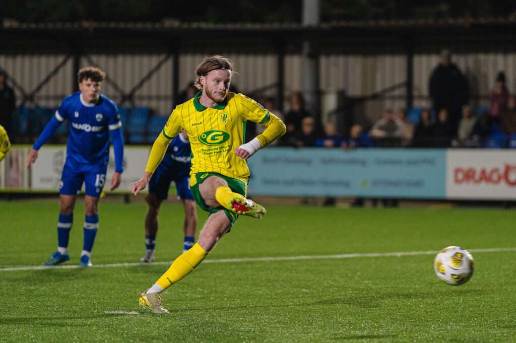 Caernarfon Town's Zack Clarke opens the scoring from the penalty spot during the Novira Cymru Premier 2026/27 fixture Haverfordwest County vs Caernarfon Town at Dynamite Bridge Meadow Stadium, Haverfordwest, Wales